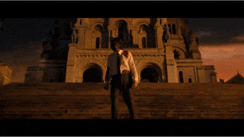 GIF of John Wick final scene showing cinematic keyframing technique with transitions from wounded protagonist to wide shot and back to close-up of his determined face.