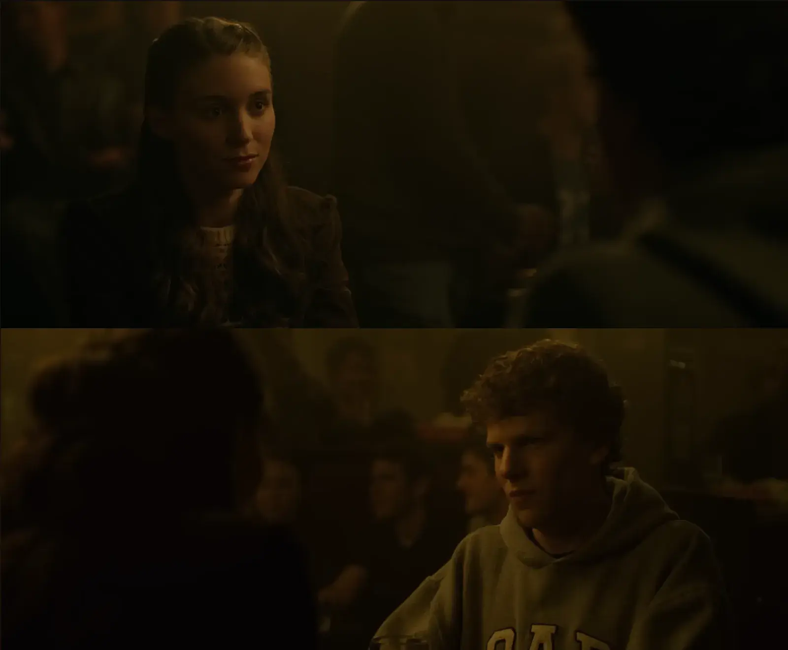 Split-screen image comparing two characters in conversation. Top: Erica faces slightly left, suggesting she's looking at Mark. Bottom: Mark faces slightly right, suggesting he's looking at Erica. This opposing directional gaze creates a natural conversational eye-line match, mimicking how people face each other when speaking in person.